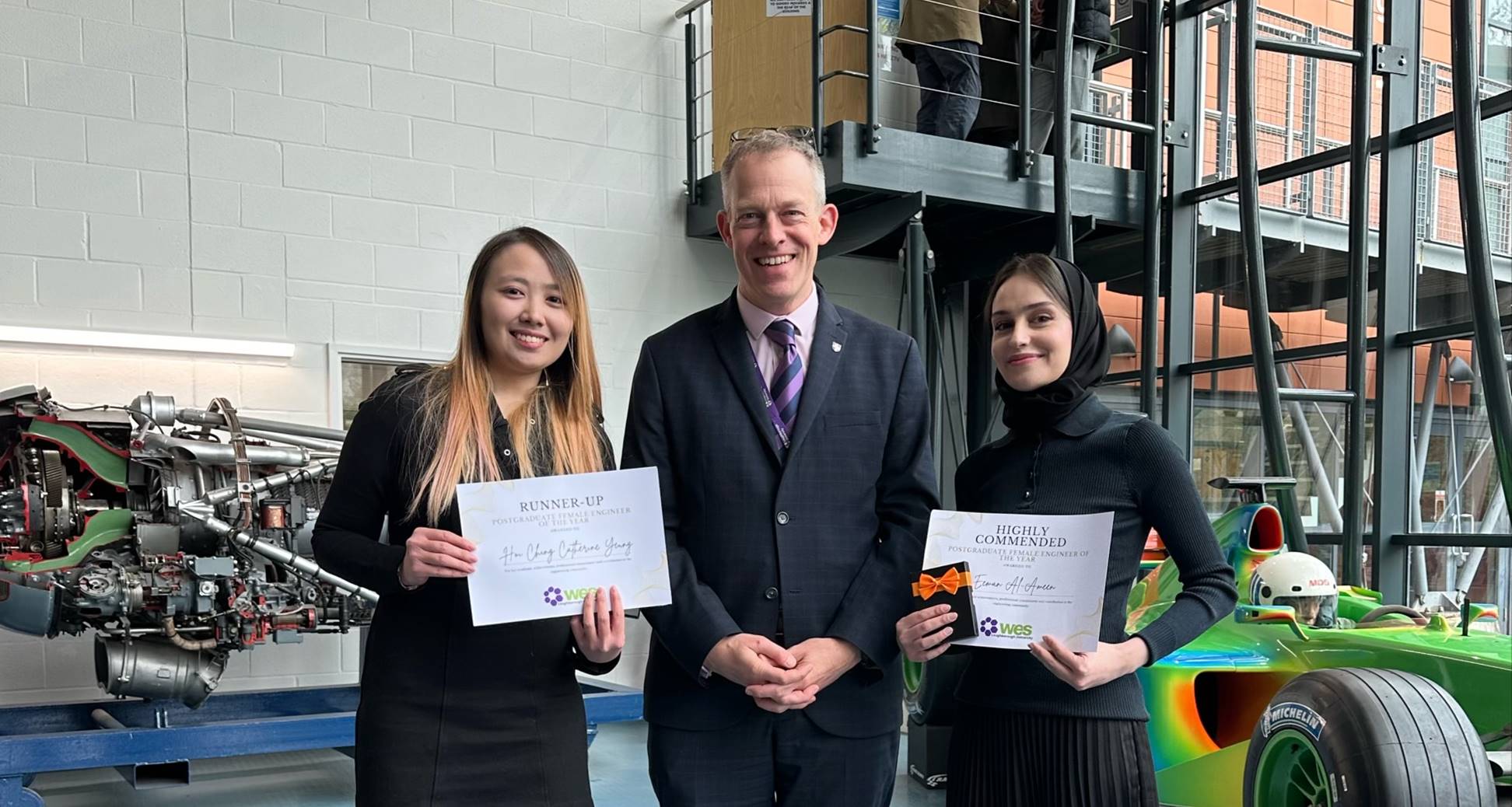 Eeman Al-Ameen and Catherine Yeung with Professor Malcolm Cook